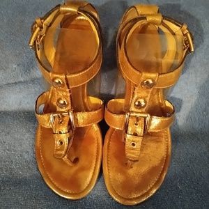 Coach metalic gold strappy Victoria sandals.